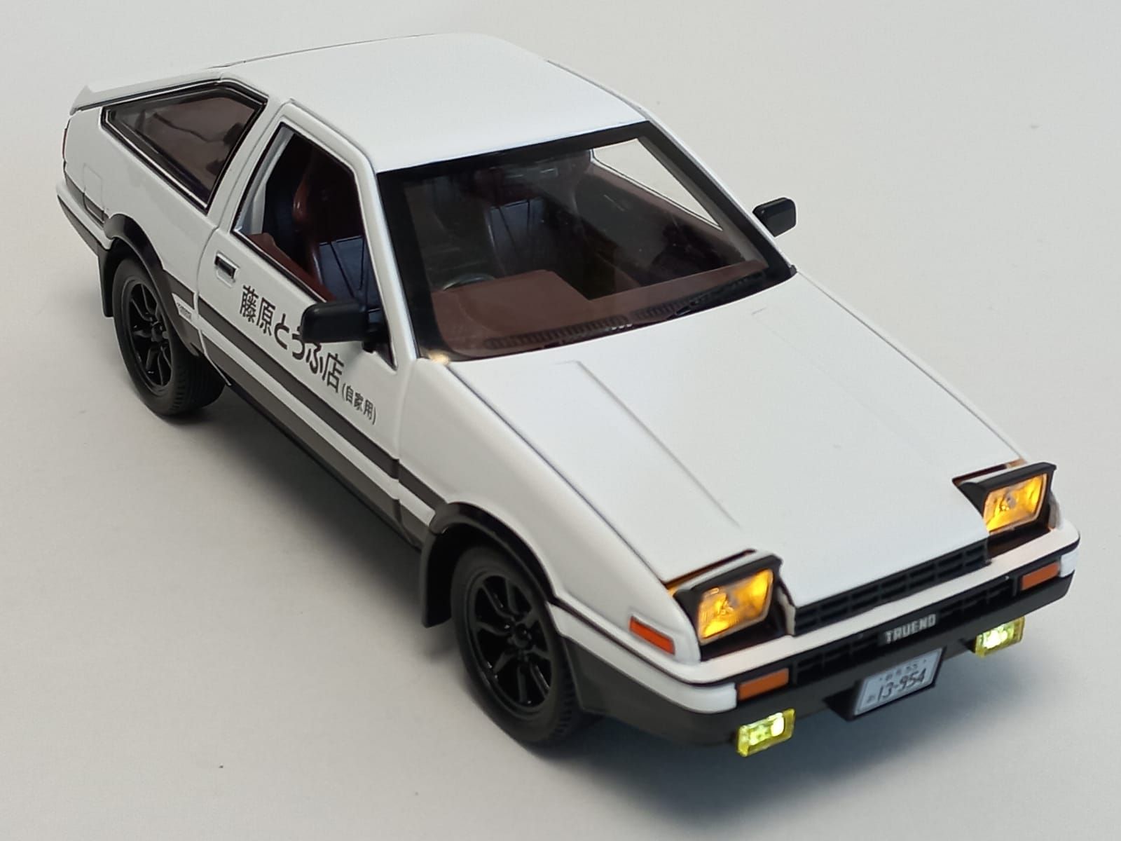 Машинка Toyota Trueno металлическая 1:24 с поднимающимися фарами, свет,  звук - купить с доставкой по выгодным ценам в интернет-магазине OZON  (871277414)