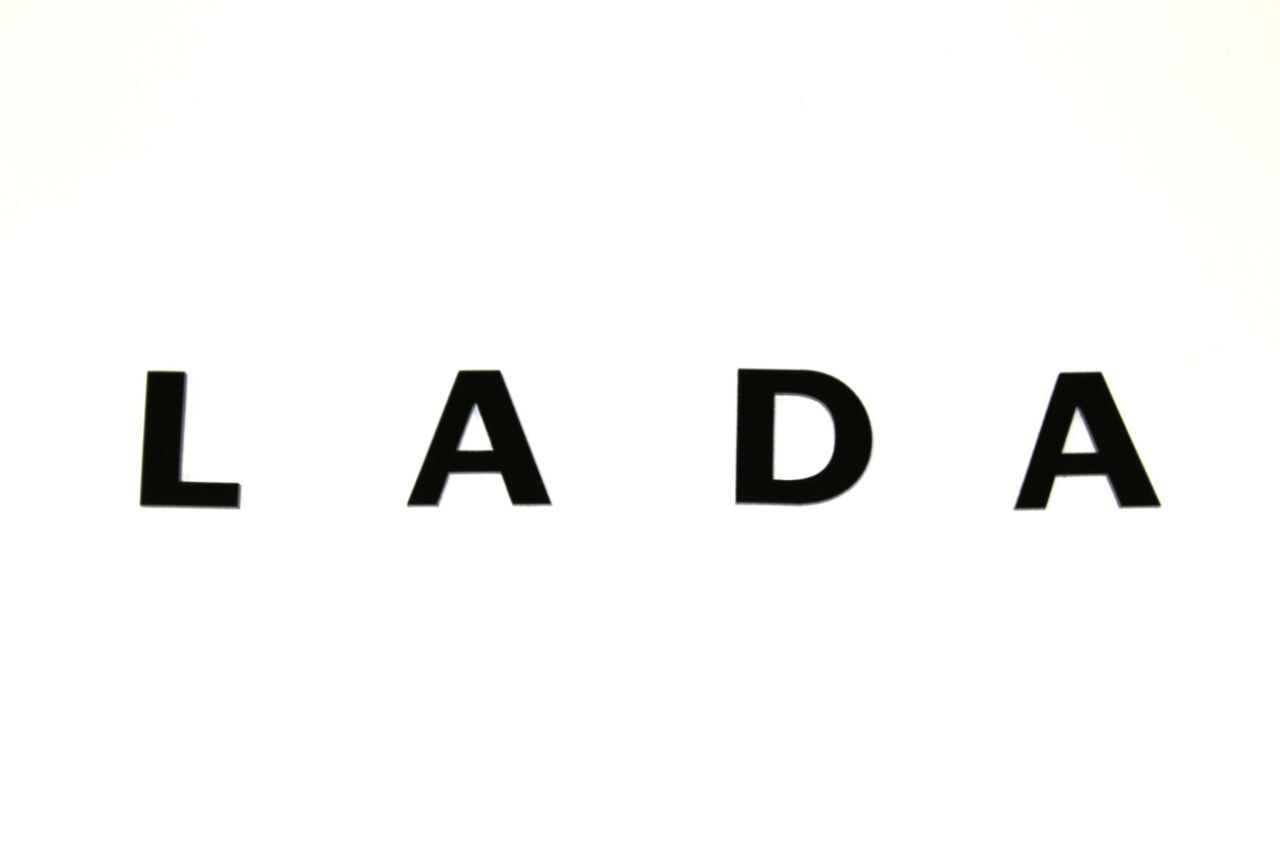 Надпись-шильдик LADA нового образца черный матовый | узнать цену и купить
