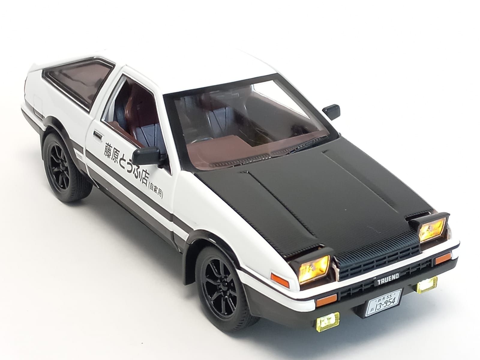 Машинка Toyota Trueno металлическая 1:24 с поднимающимися фарами, свет,  звук - купить с доставкой по выгодным ценам в интернет-магазине OZON  (871277405)