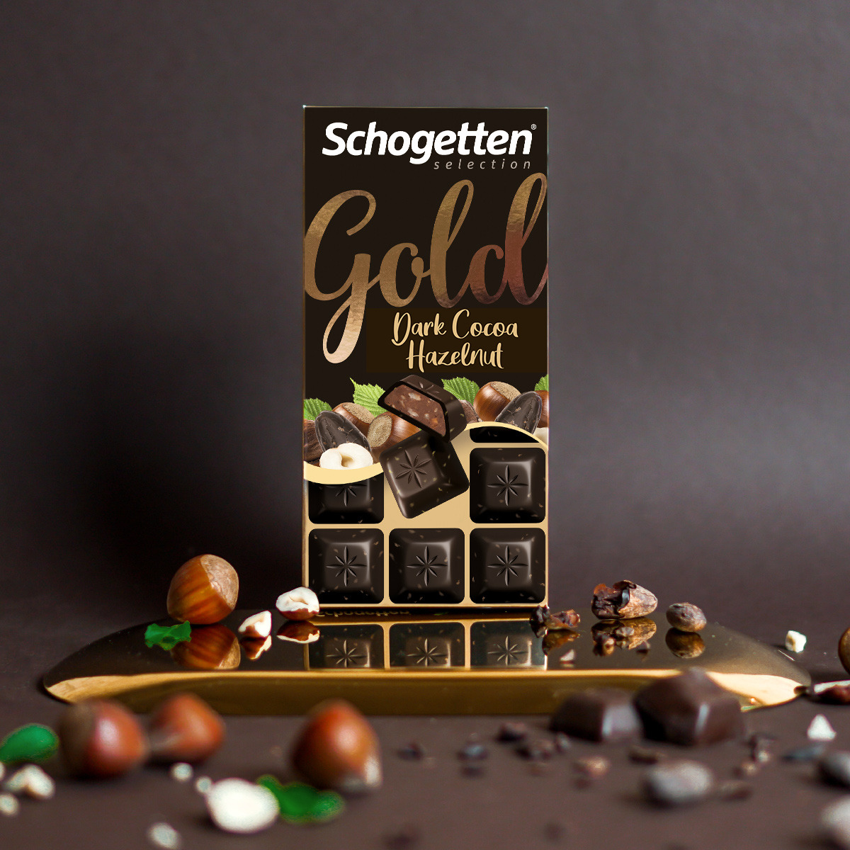 Темный шоколад Schogetten GOLD Dark Cocoa Hazelnut с дробленным фундуком и ...