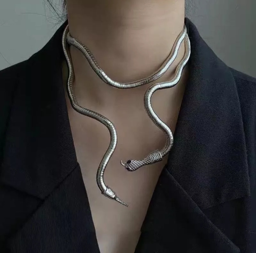 A Man with a Snake Around His Neck. White Background. Snake Around a Man`s Neck