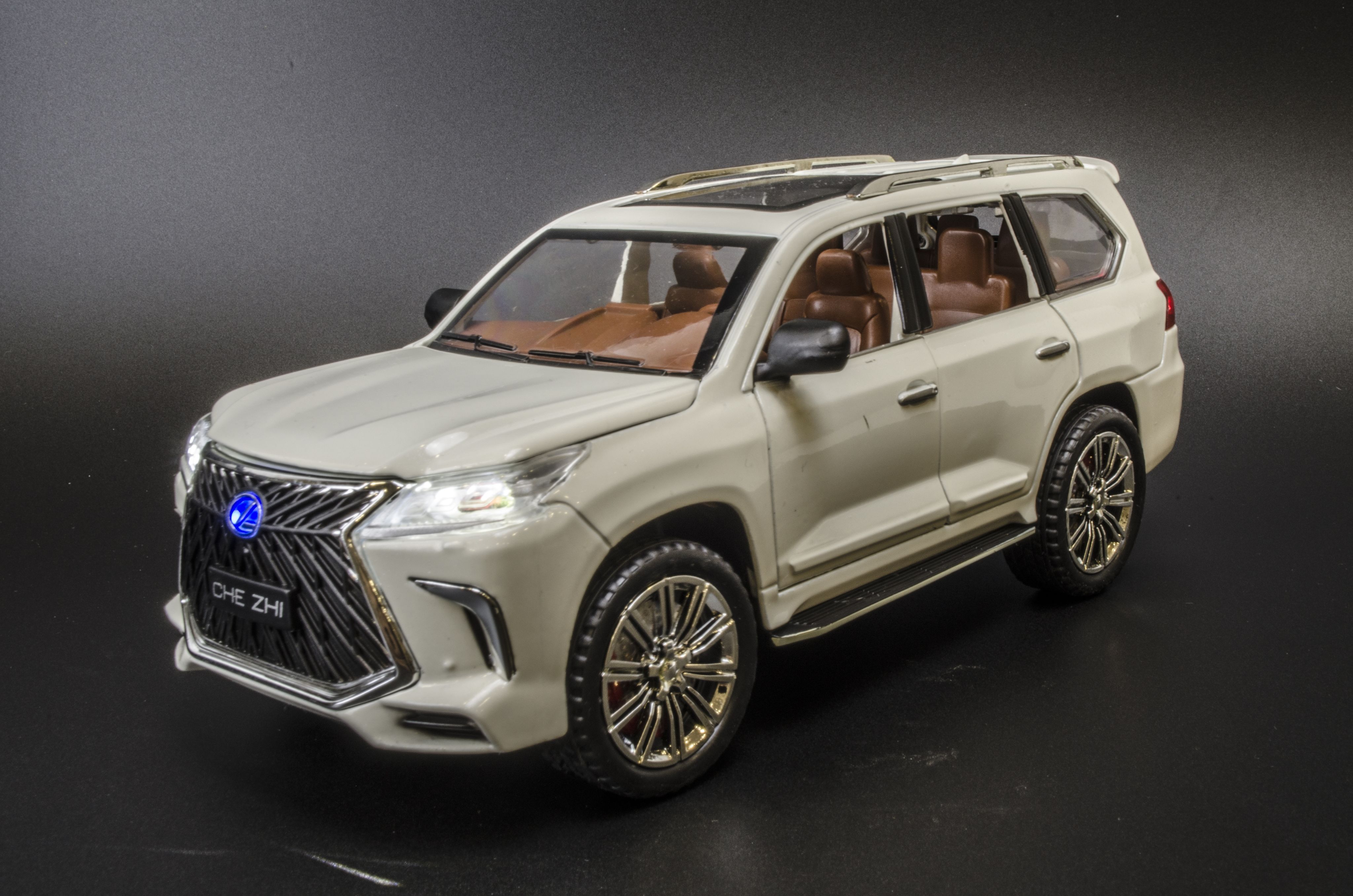 Металлическая модель машины Лексус Lexus LX 570, масштаб 1:24, длина 21 см  - купить с доставкой по выгодным ценам в интернет-магазине OZON (864535575)