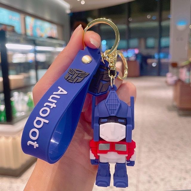 Трансформеры ключ. Брелок robocop. Брелок автоботы. Трансформер hasbro transformers оптимус. Трансформеры брелок фигурка.