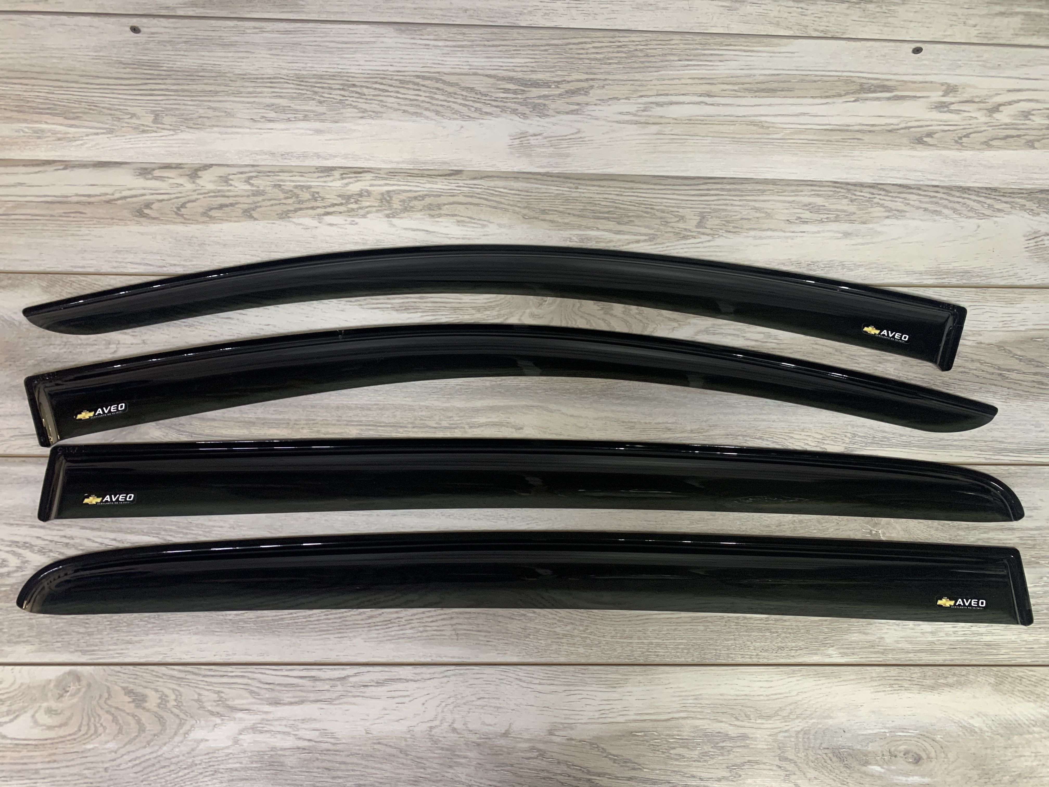 Дефлектор на окна шевроле авео т300. Дефлектор на окна шевроле авео т250. Дефлектор авео. Ветровики chevrolet aveo t250. Дефлекторы окон aveo t300 хэтчбек.