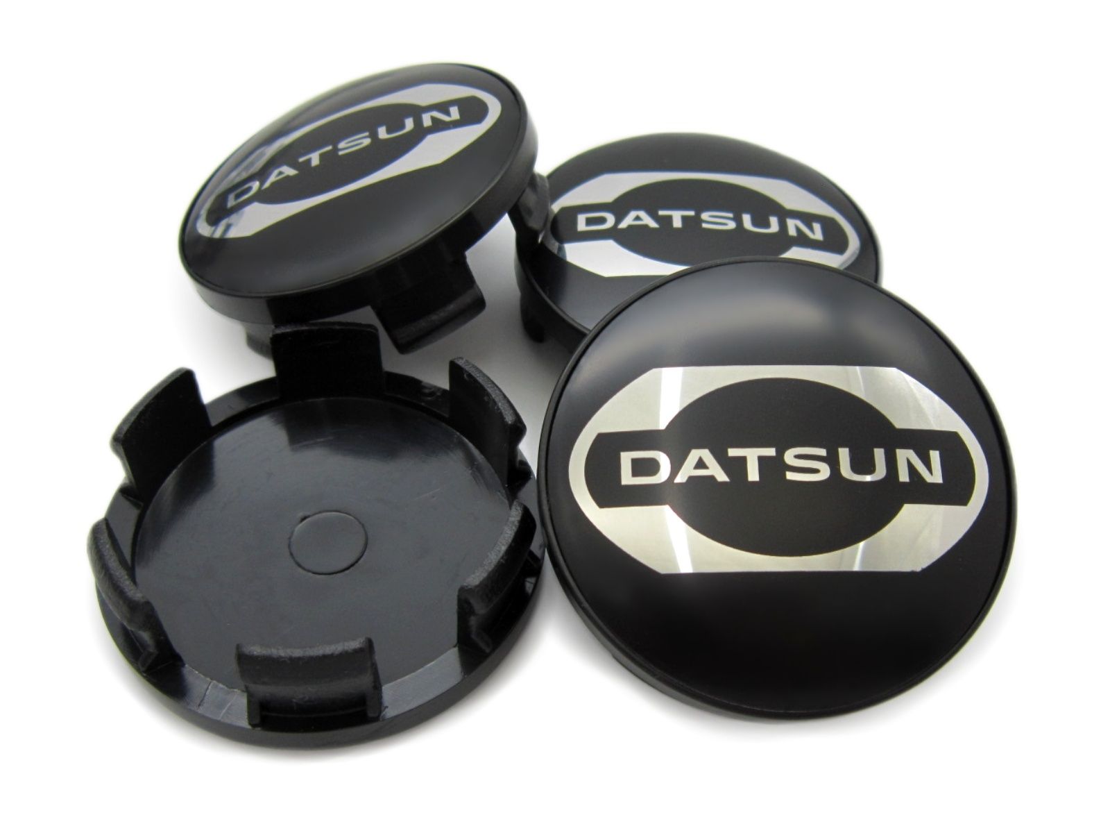 Колпаки datsun. Заглушки на датсун. Колпачок литого диска датсун. Колпачки на диски датсун. Колпачки для литых дисков газ волга.