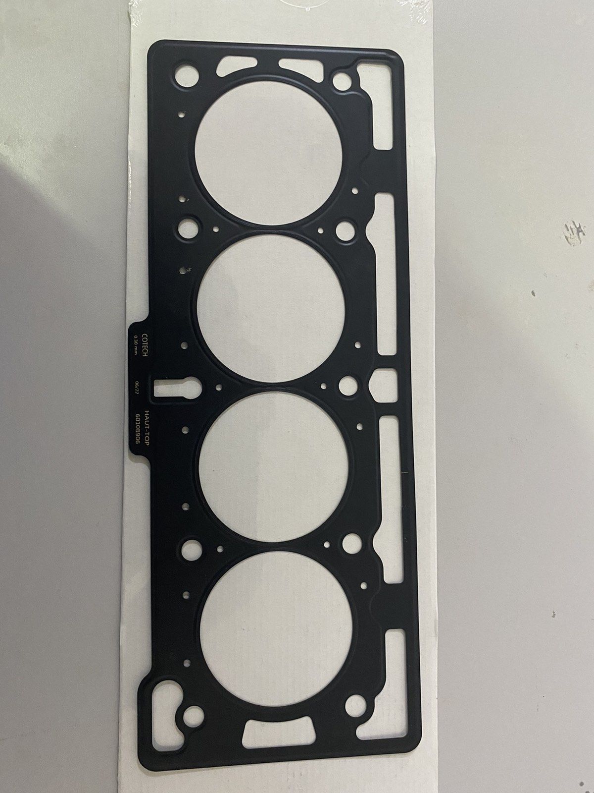 Прокладка под головку рено логан. Renault 7701475899. Прокладка ГБЦ k7j. Комплект прокладок 7701475899. K4100 прокладка ГБЦ