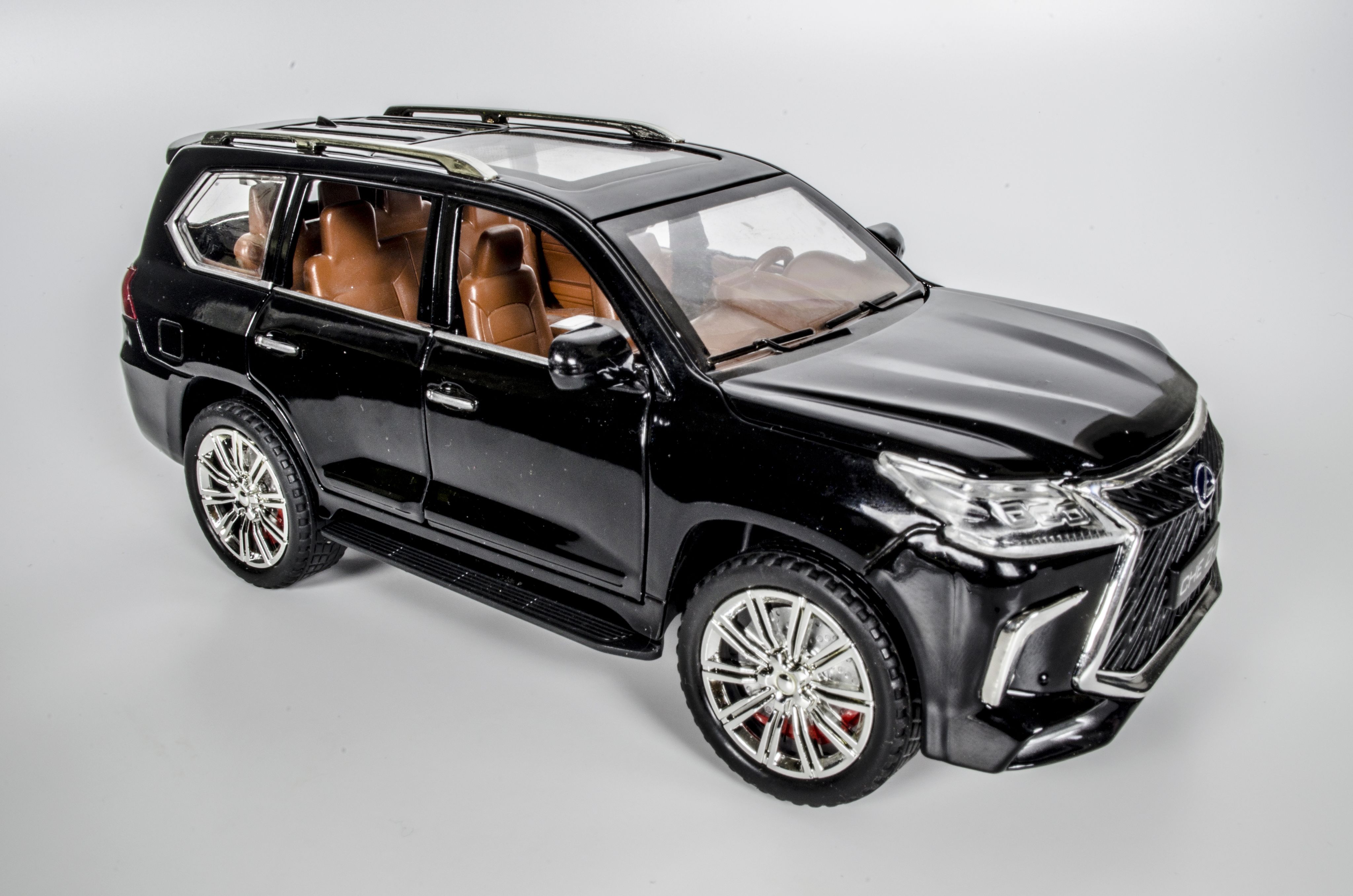 LexusLX570коллекционнаяметаллическаяинерционнаямашинка,модель1:2421смЛЕКСУСсоткрывающимисядверьми,капотом,багажникомизвуковымиисветовымиэффектами,цветчерный