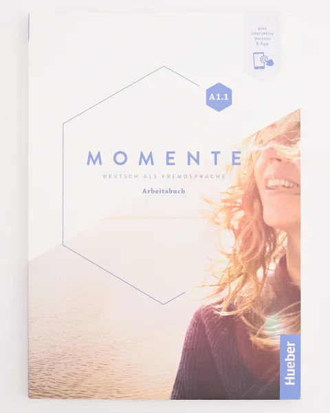 Обложка книги Momente A1.1 AB + interaktive Version, Sandra Evans;Angela Pude;Franz Specht;