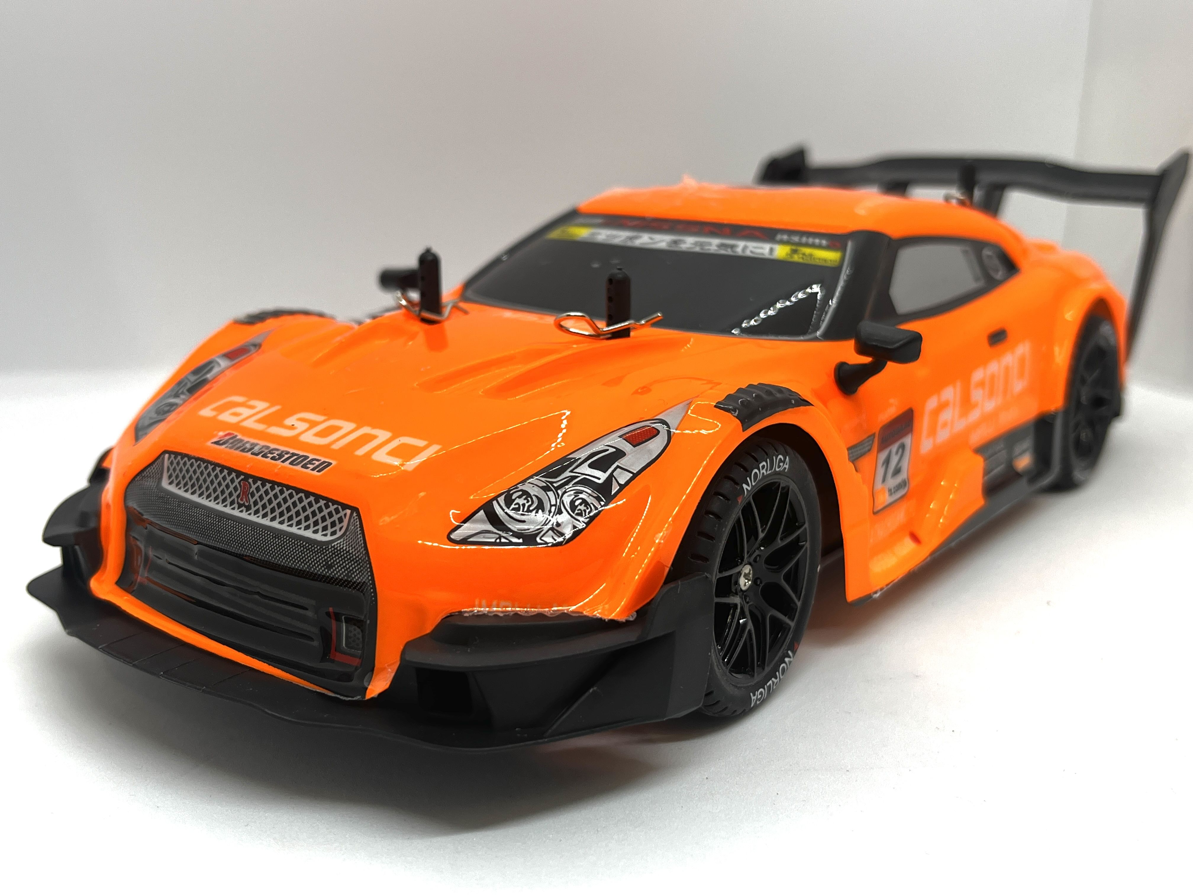 Радиоуправляемая машина для дрифта Nissan GTR R35 Nsimo 1:14 4WD 2.4g  оранжевый - купить с доставкой по выгодным ценам в интернет-магазине OZON  (1328658544)