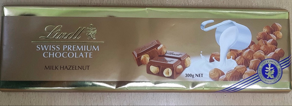 Шоколад Lindt Swiss Premium молочный с цельным фундуком 300г