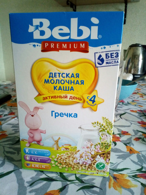 Молочная каша bebi premium 4 злака со сливками и персиком